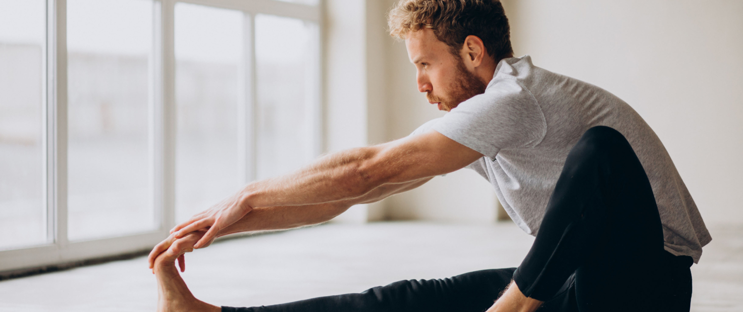 Mann beim Dehnen – designed by senivpetro – freepik